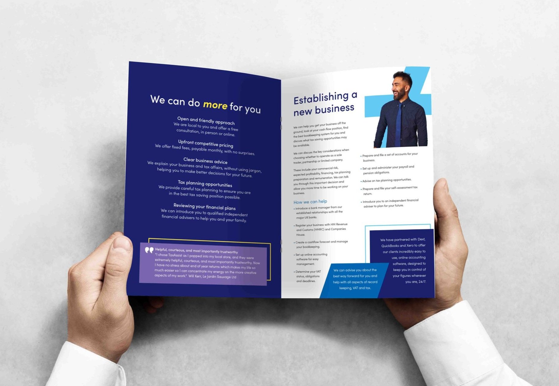 Open brochure with blue and white design, featuring text about establishing a new business, with a photo of smiling man in business attire on the right page.